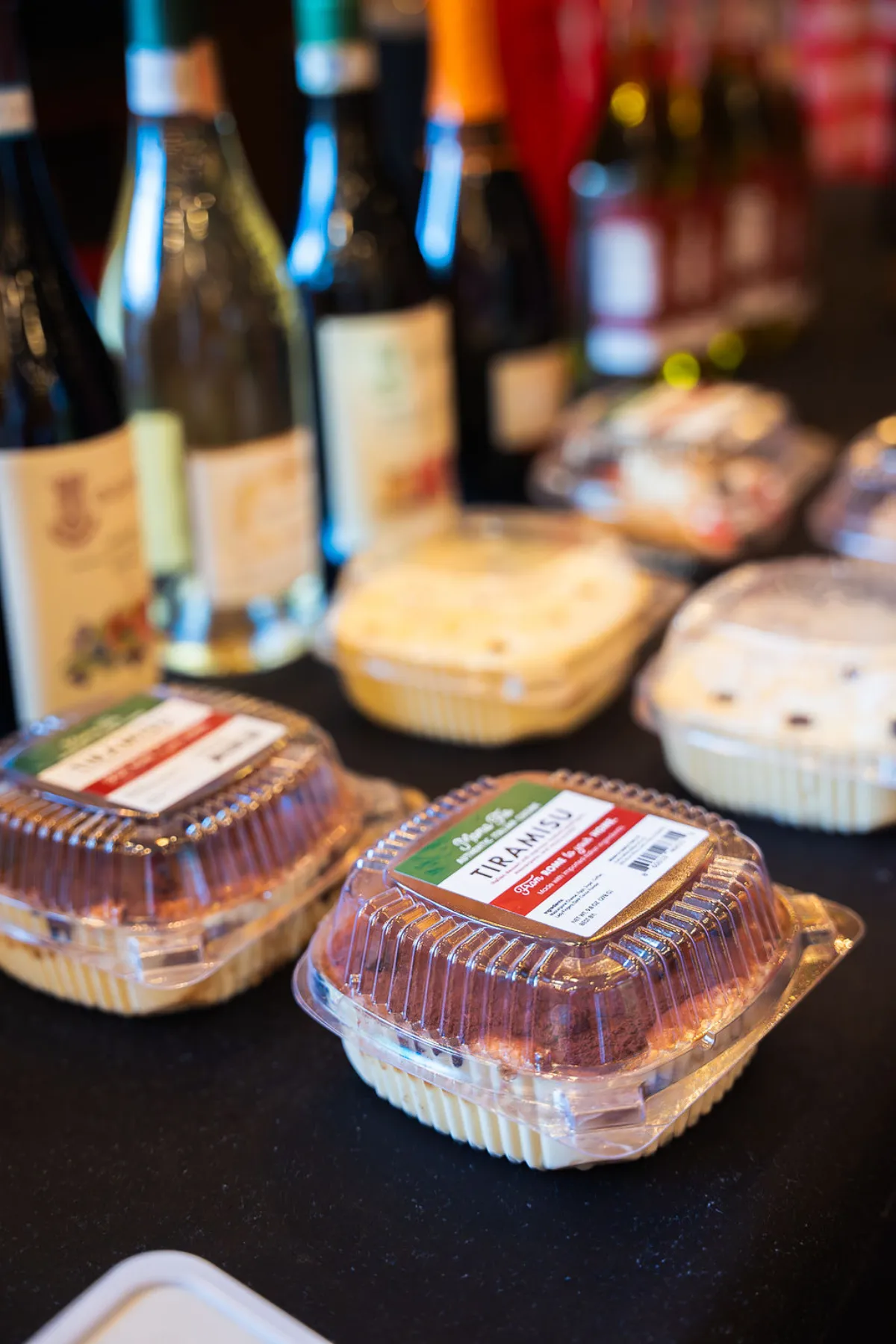 Tiramisu and wine on display at the winter market