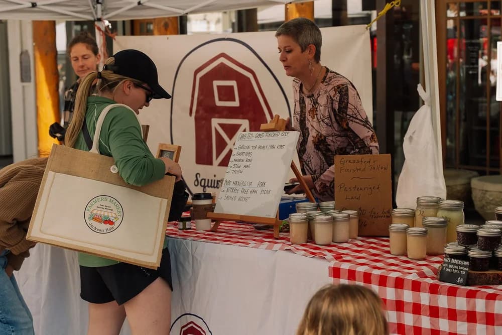 A Saturday morning at the market under the antler arches